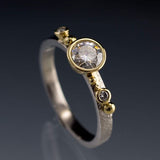 Bague vintage en argent avec zircone ronde