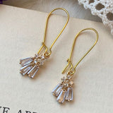 Boucles d'oreilles vintage pendantes en verre et or