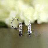 Boucles d'oreilles vintage à trois pierres