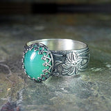 Bague émeraude fleur sculptée