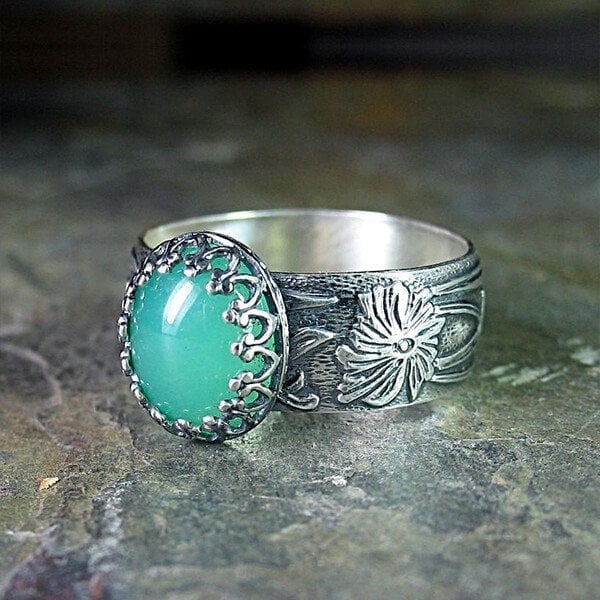 Bague émeraude fleur sculptée