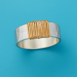 Bague vintage en argent avec fils dorés