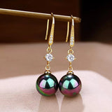 Éclat d'Or™ | Boucles d'oreilles dorées en matière raffinée
