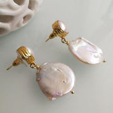 Boucles d'oreilles vintage en perles baroques arrondies