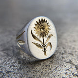 Bague vintage en argent avec sceau et motif tournesol