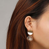 Boucles d'oreilles vintage en or à sphères creuses