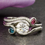 Bague vintage en verre rouge et bleu en spirale