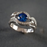 Bague vintage en argent avec œil en cristal bleu