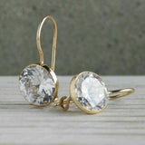 Boucles d'oreilles vintage en verre blanc arrondi et or