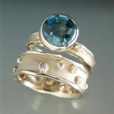 Bague vintage en argent avec zircone bleue