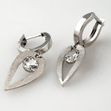 Boucles d'oreilles vintage en argent forgé et zircone