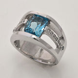 Bague vintage en argent avec incrustation de verre bleu