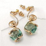 Boucles d'oreilles vintage en cristal vert irrégulier