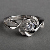 Bague vintage en argent avec zircone irrégulière en forme de fleur