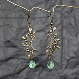 Boucles d'oreilles vintage pendantes avec pierres vertes