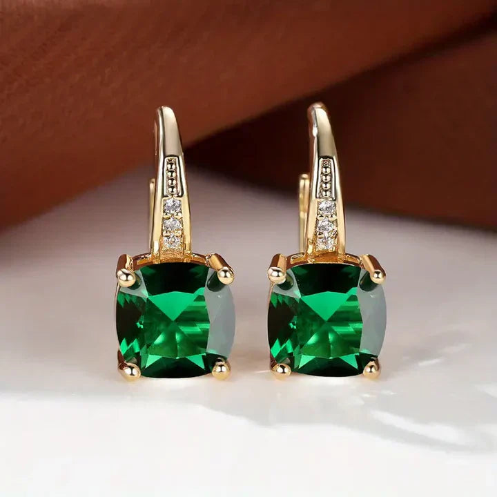 Boucles d'oreilles créoles en or avec pierres mystérieuses