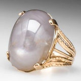 Bague vintage en or avec pierre blanche brillante