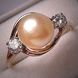 Bague vintage rose avec perle et zircone