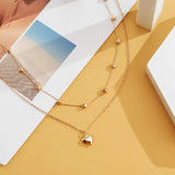 Collier vintage avec pendentif double cœur