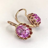 Boucles d'oreilles vintage en or avec verre rose arrondi