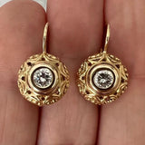 Boucles d'oreilles vintage arrondies en or brillant