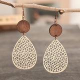 Goutte Élégante™ | Boucles en matière raffinée