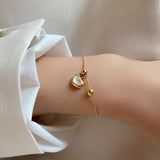 Love Bracelet with White Opal in Gold