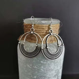 Boucles d'oreilles créoles vintage en argent creuses
