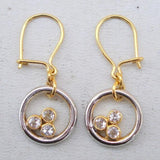 Boucles d'oreilles vintage en or et argent avec trois zircons