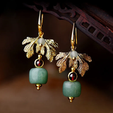 Boucles d'oreilles vintage en zircone rouge dorée