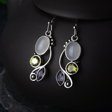 Boucles d'oreilles vintage en zircone jaune et pierre de lune