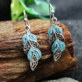 Boucles d'oreilles vintage en argent avec feuilles bleues