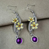Boucles d'oreilles vintage en zircone violette et argent