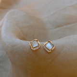 Boucles d'oreilles élégantes avec cristal doré en forme de lune