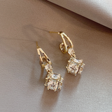 Boucles d'oreilles élégantes en zircone cubique et or