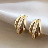 Élégantes boucles d'oreilles à trois anneaux plaquées or