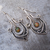 Boucles d'oreilles vintage rouges verdâtres