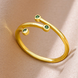 Bague triple zircone verte dorée