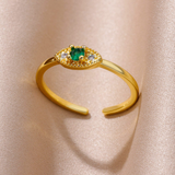 Bague œil en zircone verte dorée