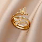 Bague papillons en zircone dorée