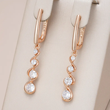Boucles d'oreilles pendantes avec cristaux blancs