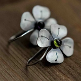 Boucles d'oreilles vintage en zircone verte en forme de fleur