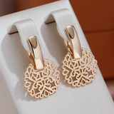 Élégantes boucles d'oreilles mandala dorées