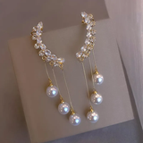 Boucles d'oreilles pendantes élégantes en perles