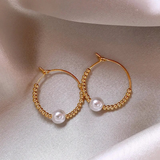 Boucles d'oreilles en or avec perles