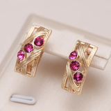 Boucles d'oreilles élégantes en or avec zirconias grenat