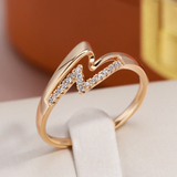 Bague élégante Eclair doré et brillant