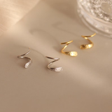 Boucles d'oreilles vintage en spirale or et argent