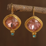 Boucles d'oreilles vintage en zircone rouge et or