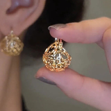 Boucles d'oreilles vintage à sphères dorées